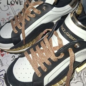 Dolce & Gabbana Black and White Sneakers with Gold Accents
